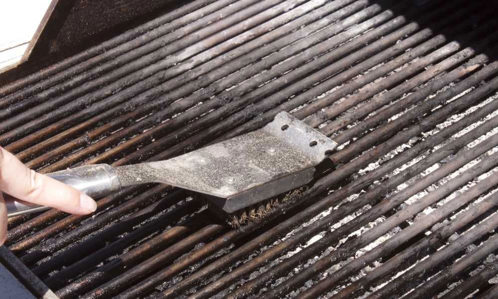 How do you clean a BBQ grill after use?