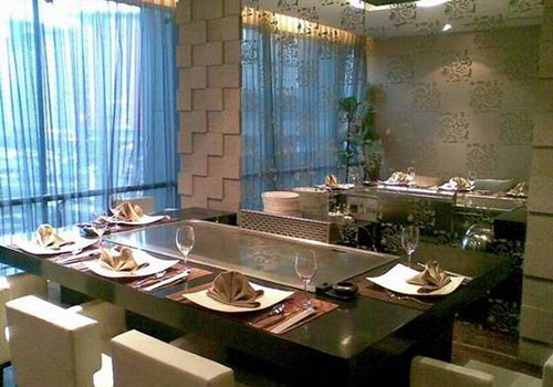 Teppanyaki Table: A New Type of Interactive Dining