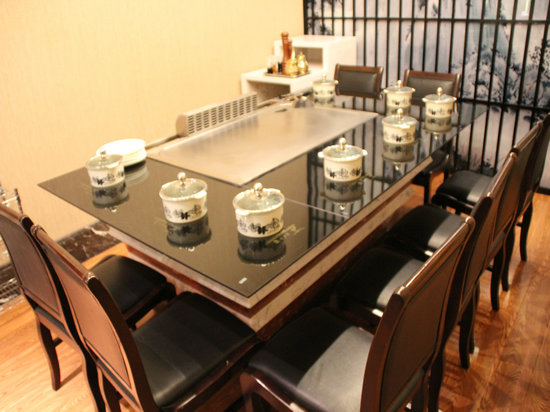 Showcasing Skills on Teppanyaki Grill Table for Charity Event